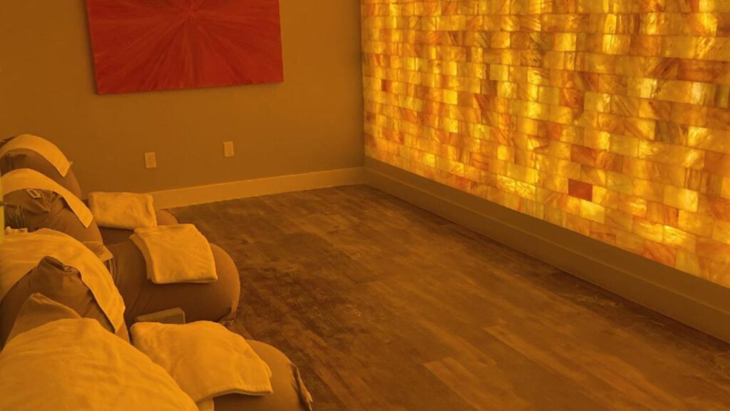 The Himalayan salt wall in the peaceful Salt Therapy room at Sage Blossom Massage Oak Hill.